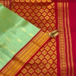 Kuppadam Silk Cotton in pista green and crimson