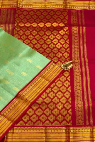 Kuppadam Silk Cotton in pista green and crimson