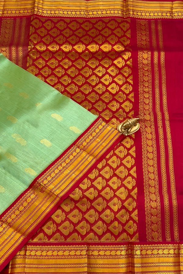 Kuppadam Silk Cotton in pista green and crimson